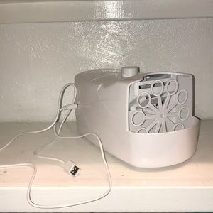 Electric bubble machine.